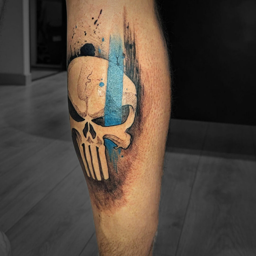skull punisher et bande de couleur bleu fond éclaboussures