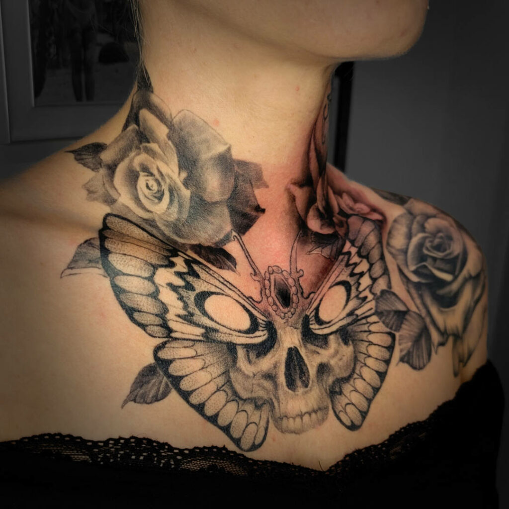 Spintattoo Lyon tatouage brignais réalisme papillon roses